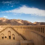 Stunning view of the Nizwa fort surrounded by mountains (Ad Dakhiliyah, Oman)