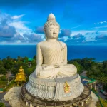 blue sky and blue ocean are on the back of Phuket Big Buddha.
