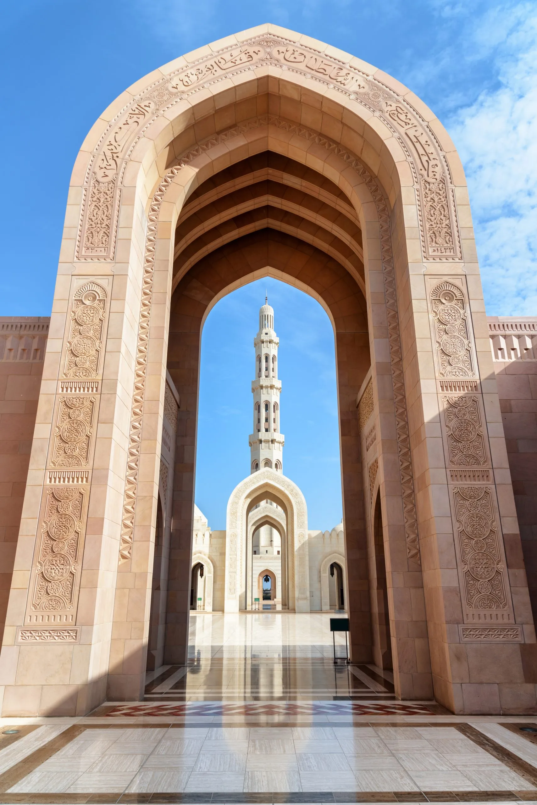 Scenic arches in courtyard of the Sultan Qaboos Grand Mosque