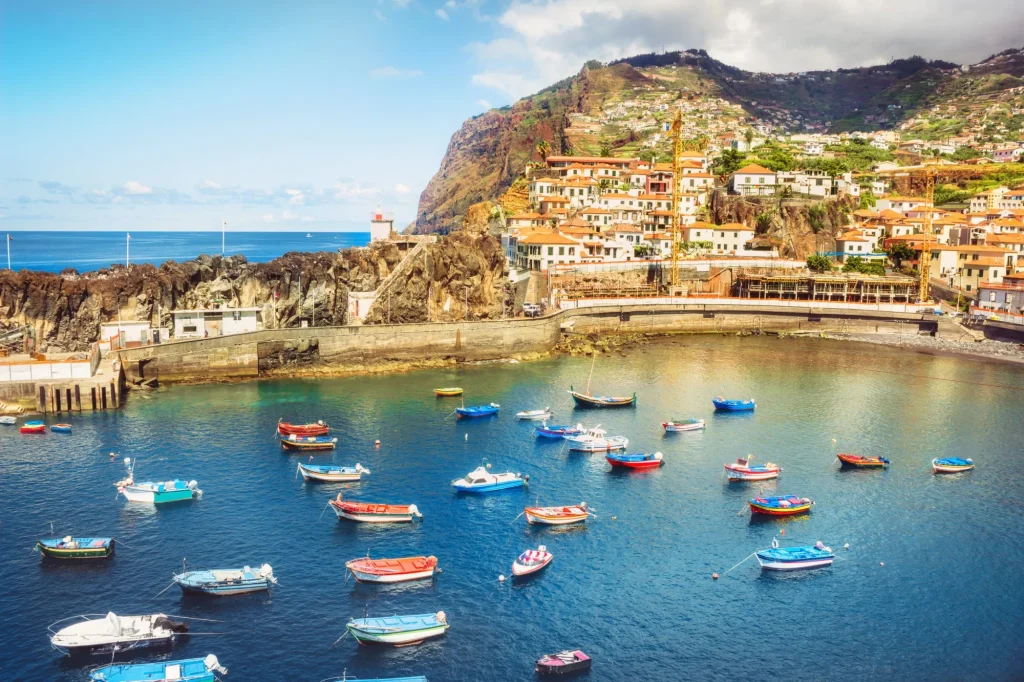 Colorful fishing boats in Camara de Lobos port Madeira island, Portugal