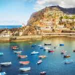 Colorful fishing boats in Camara de Lobos port Madeira island, Portugal